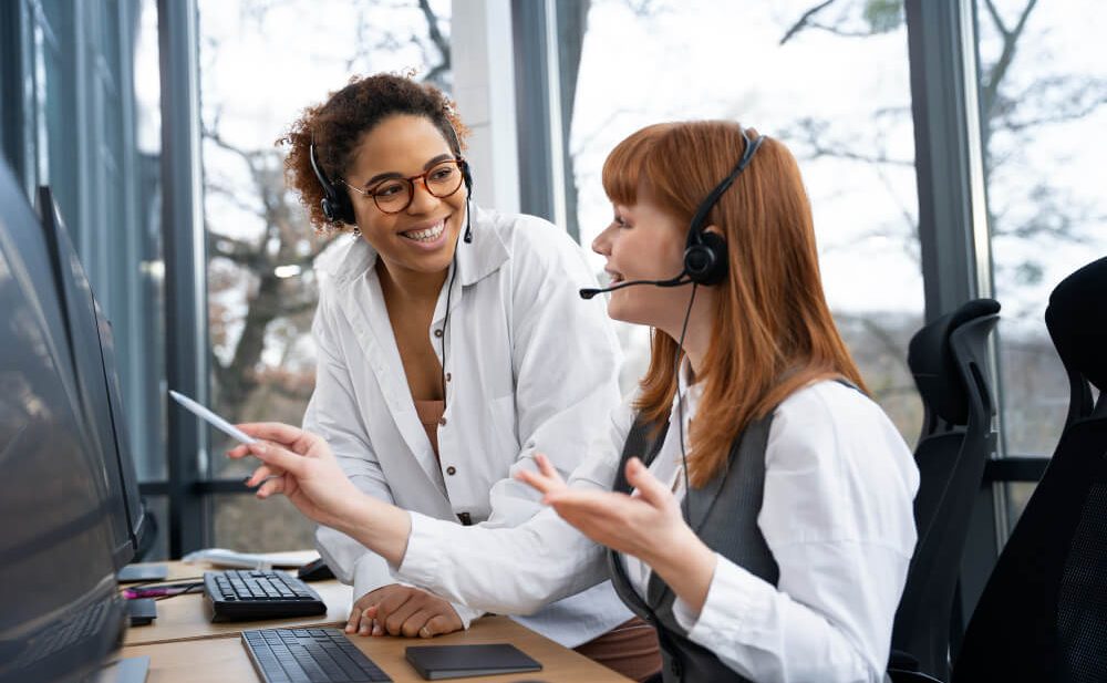 Two Customer Support Reps On A Call