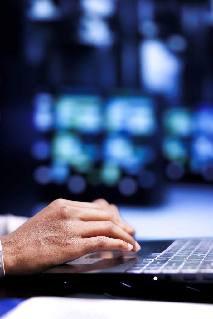 close up shot manager server hub using laptop set up configuration management tools that enable automatic failover load balancing preventing rackmounts data loss