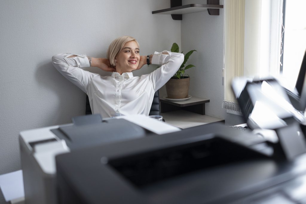woman relaxing office printer