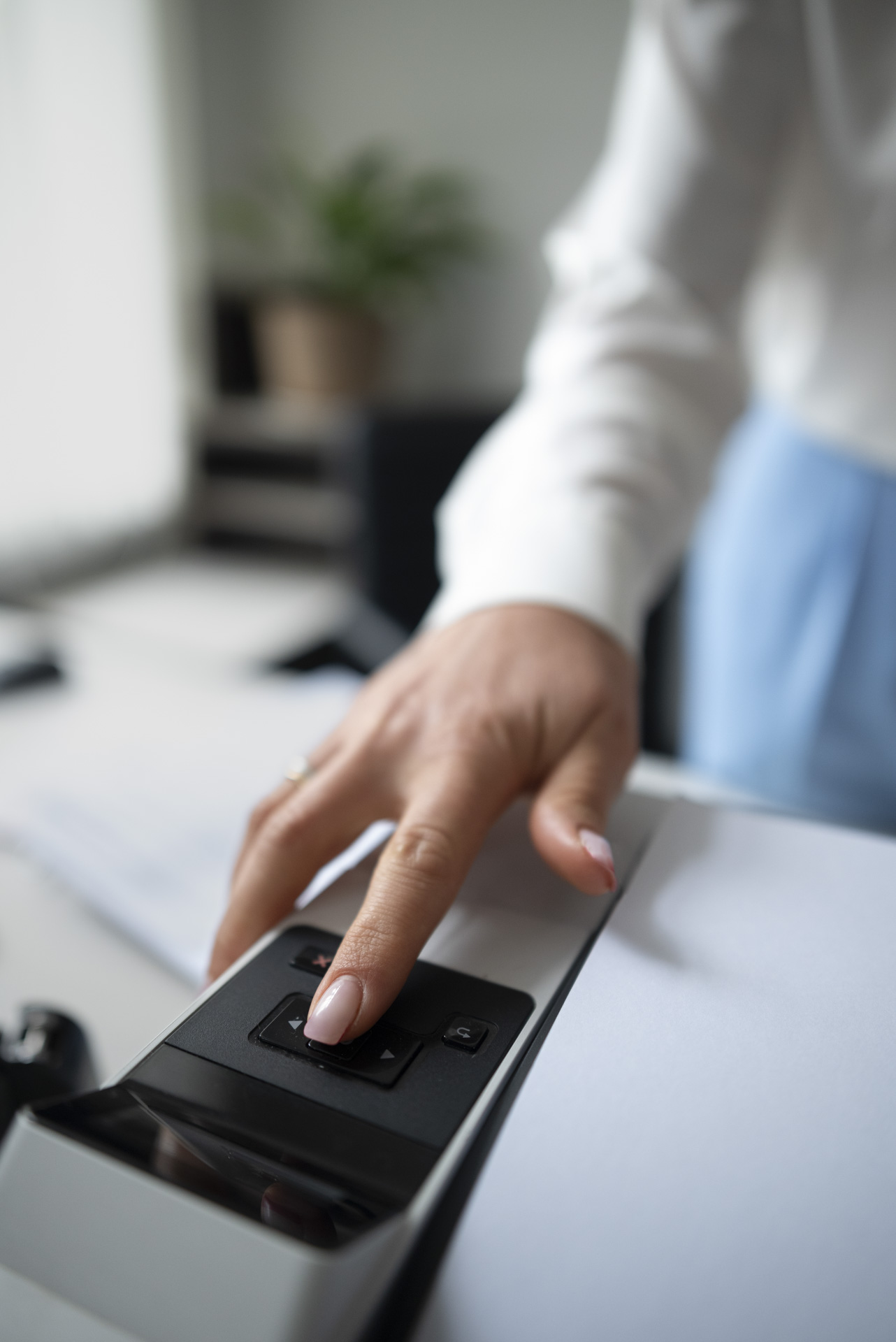 woman using printer while working office 1