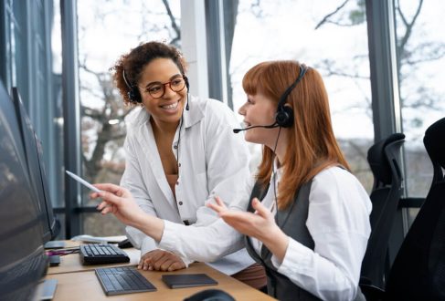 Two Customer Support Reps On A Call
